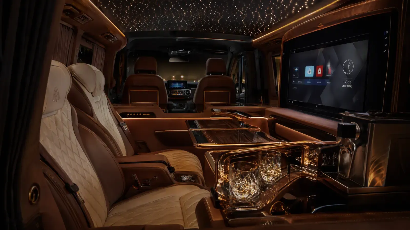 Fully customized luxury van interior with captain seats and starlight ceiling — custom VIP vans Dubai