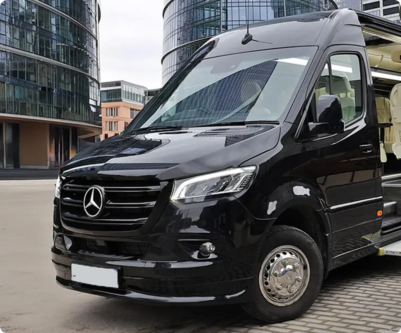 Three-across VIP rear seating row in a Barugzai converted van — 3x3 configuration Dubai